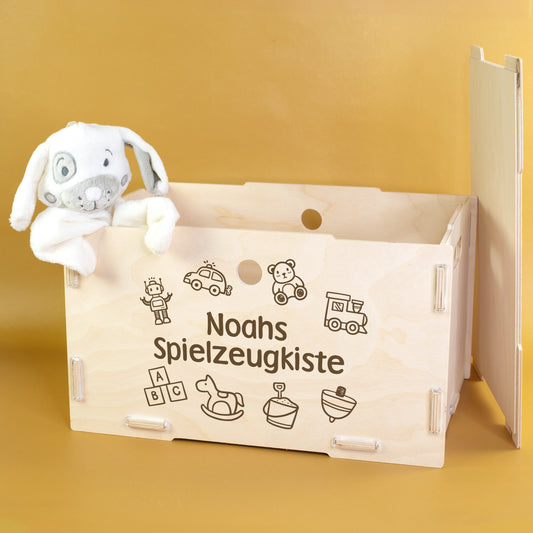 Personalisierte Holz-Spielzeugkiste von clipfritz® mit Name und Spielzeug-Motiven