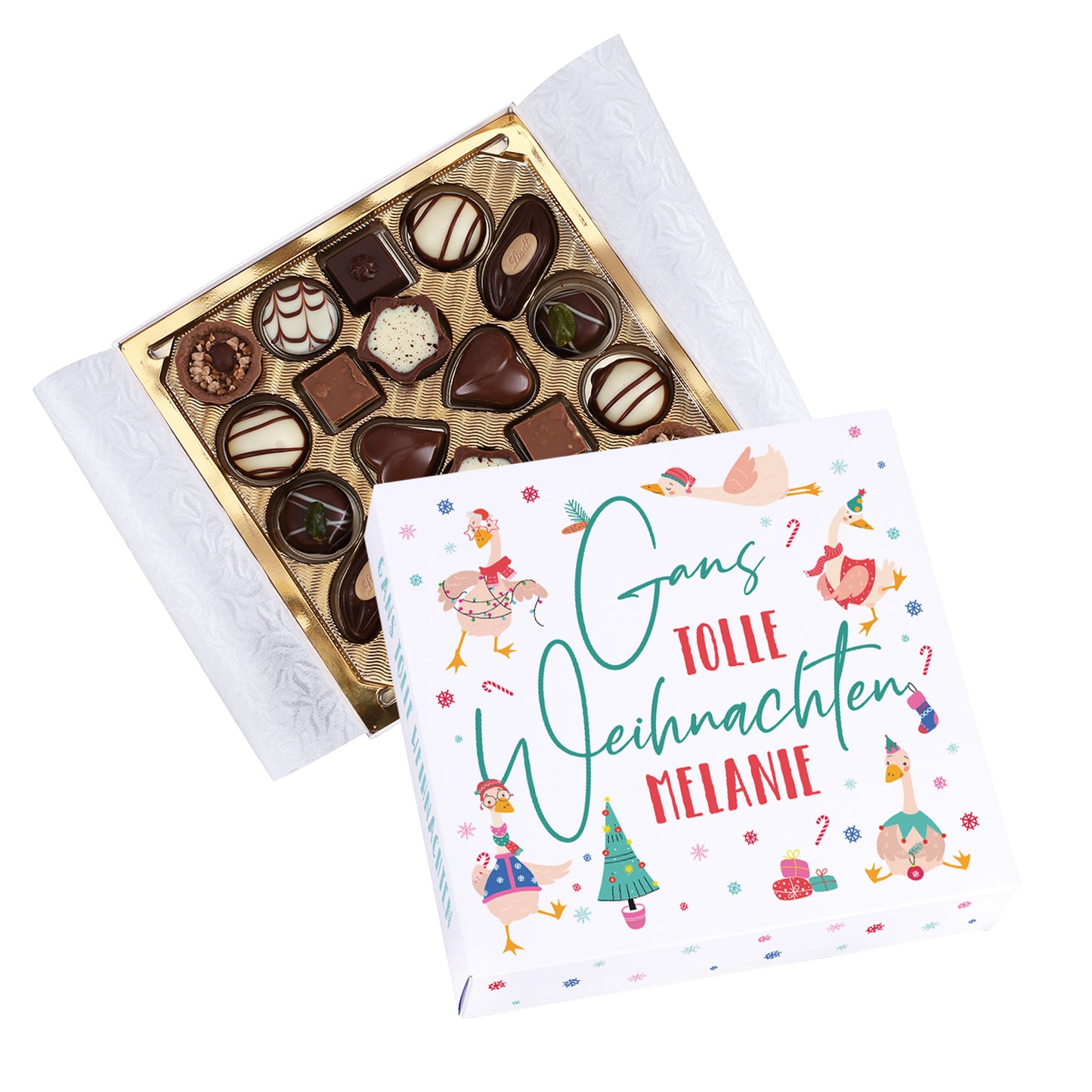 Freigestellte Lindt Pralinenbox mit Spruch „Gans tolle Weihnachten Melanie“ und geöffnetem Deckel, zeigt edle Lindt Mini-Pralinés.