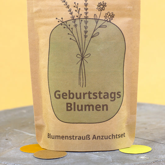 Nahaufnahme vom Blumenstrauß Anzuchtset Geburtstagsblumen mit Kraftpapierbeutel und Blumen Motiv