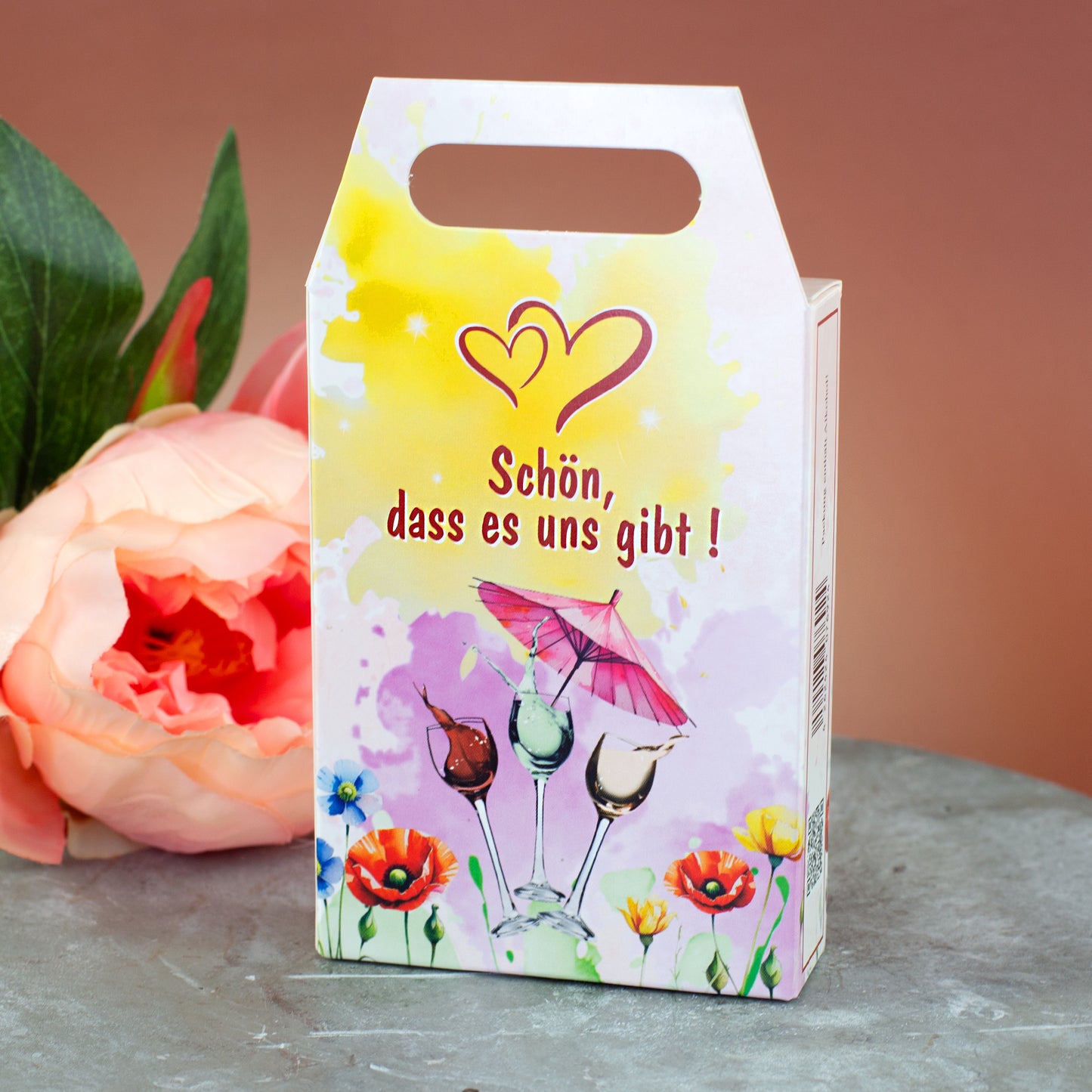 Rückseite des Likör Geschenksets „Mädelsrunde“ mit Tragegriff und Blumenmotiv