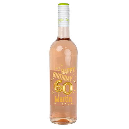 Roséweinflasche mit Etikett zum 60. Geburtstag, goldene Ballons „60“, Name Martin, vor weißem Hintergrund