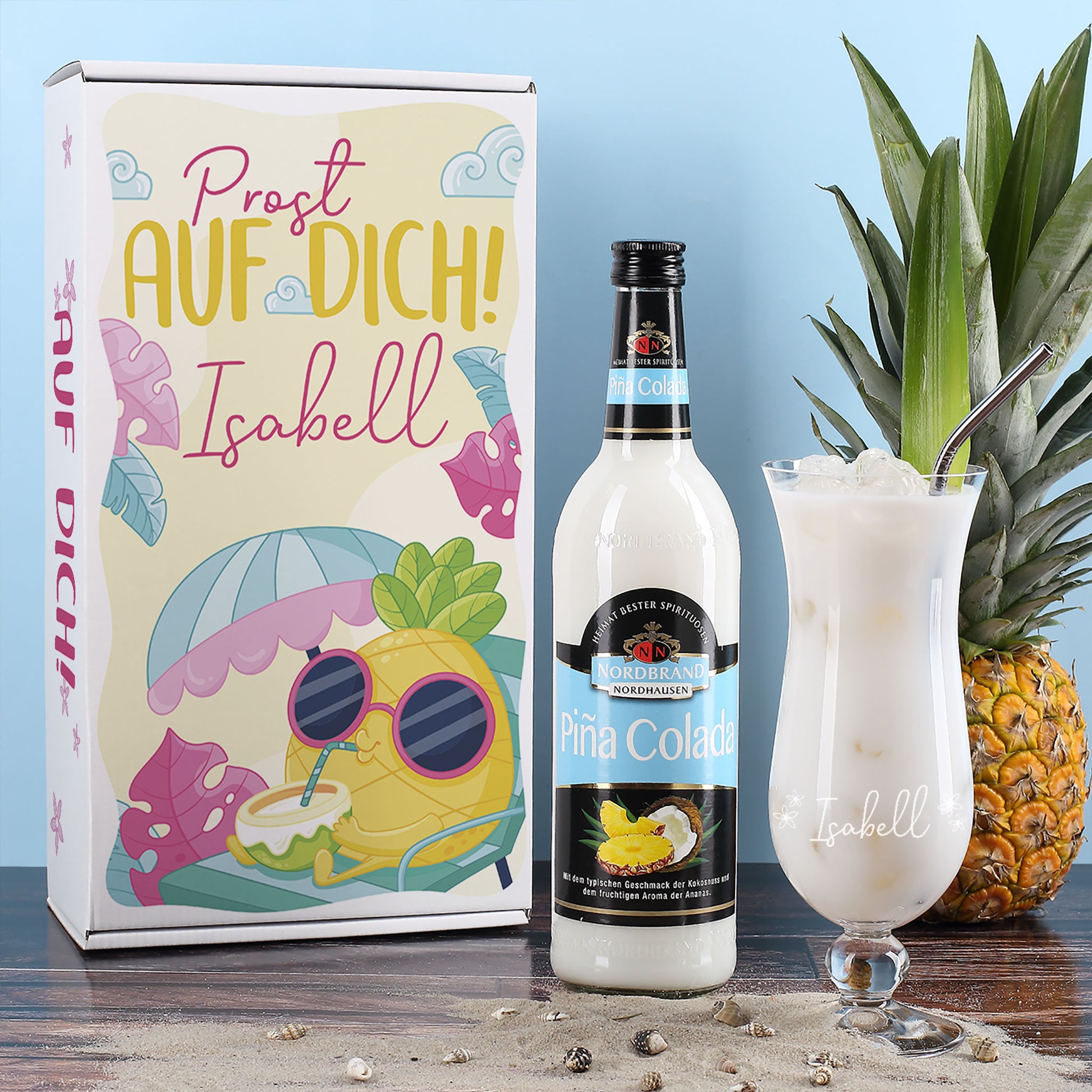 Cocktail-Geschenkset mit graviertem Glas, Piña Colada und bunter Geschenkbox – frontal