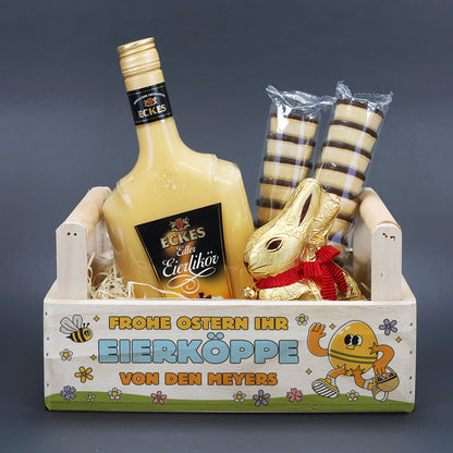 Eierlikör Geschenkset zu Ostern mit Lindt Goldhase im Holzkorb mit Spruch Frohe Ostern ihr Eierköppe