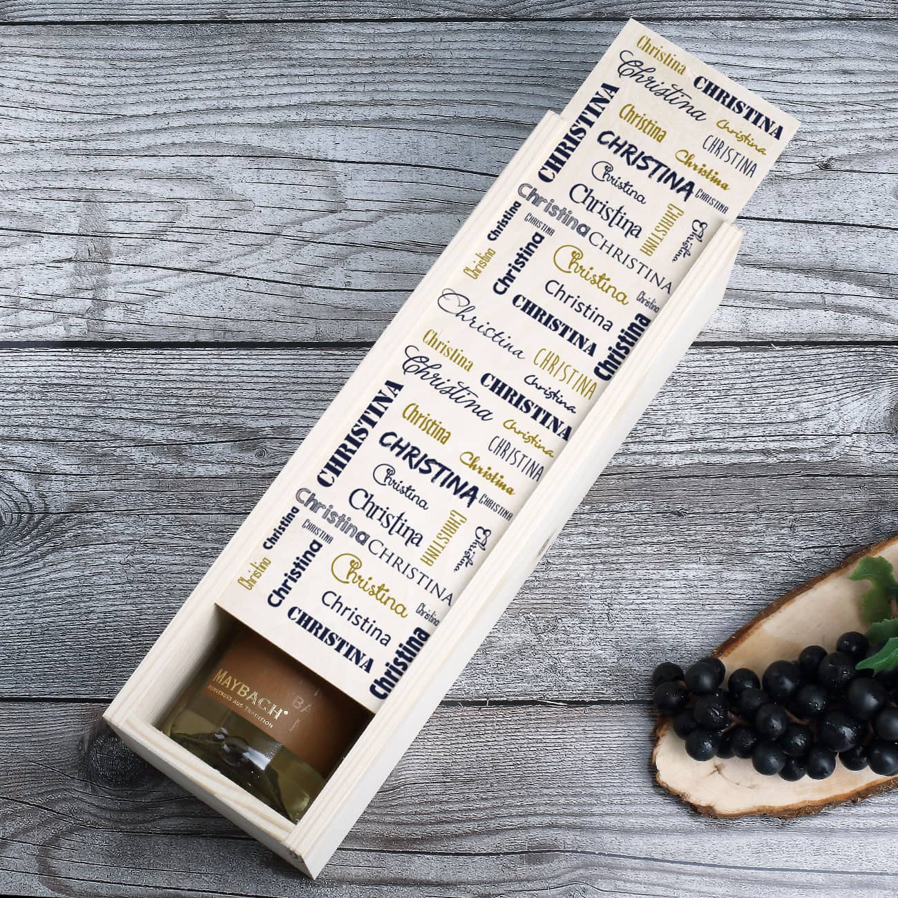 Holzkiste mit bedrucktem Schiebedeckel