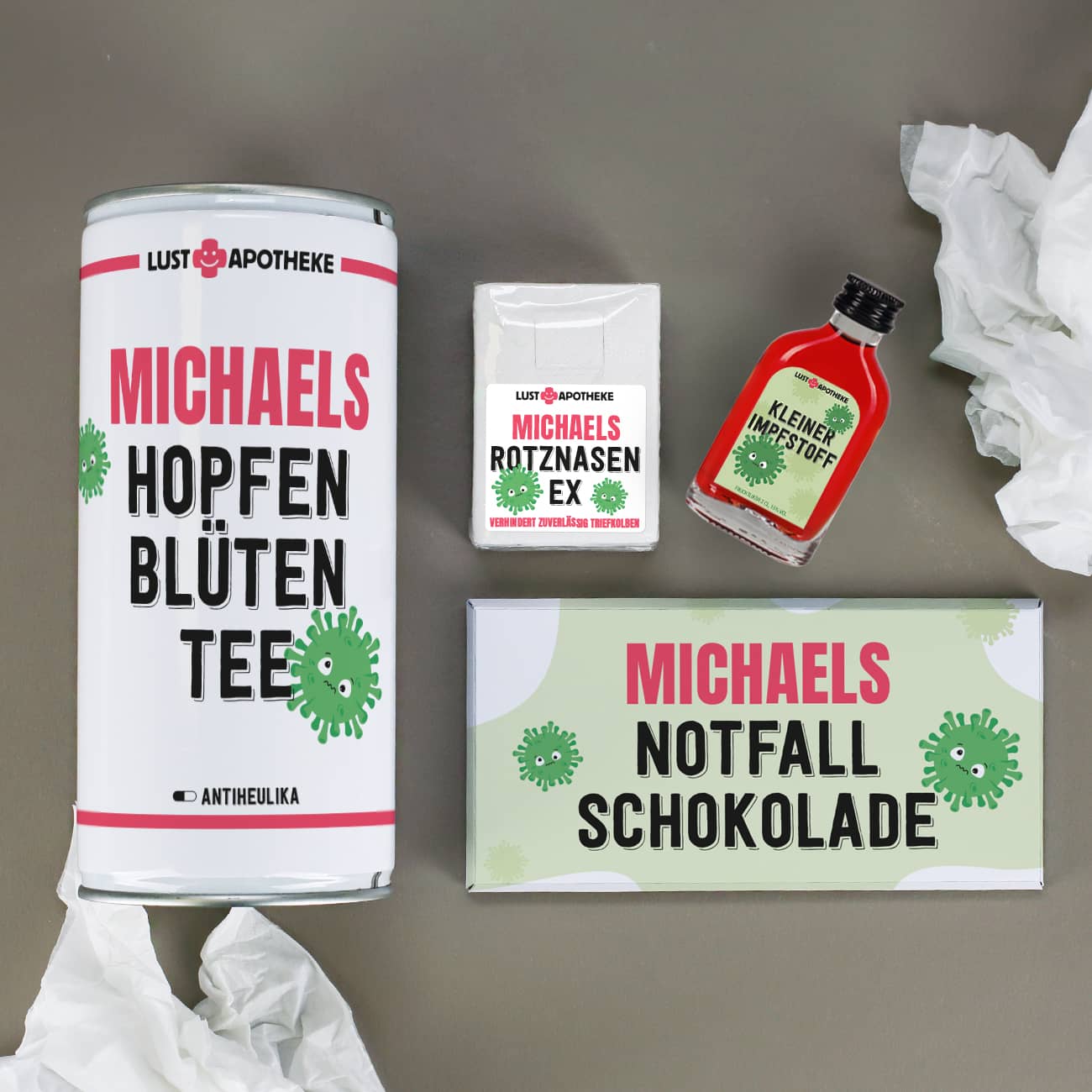 Geschenkset bei Männerschnupfen mit Bier, Schnaps, Schokolade und Taschentüch