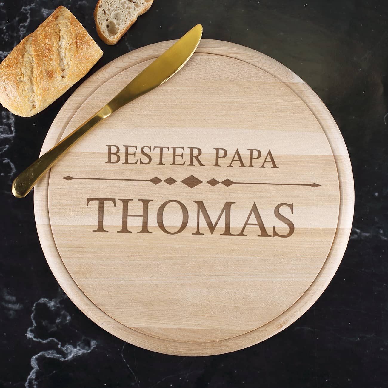 Rundes Schneidebrett mit Name und Text graviert