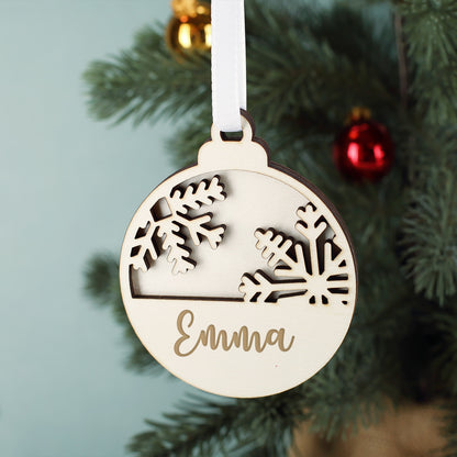 Weihnachtskugel aus Holz mit Name graviert
