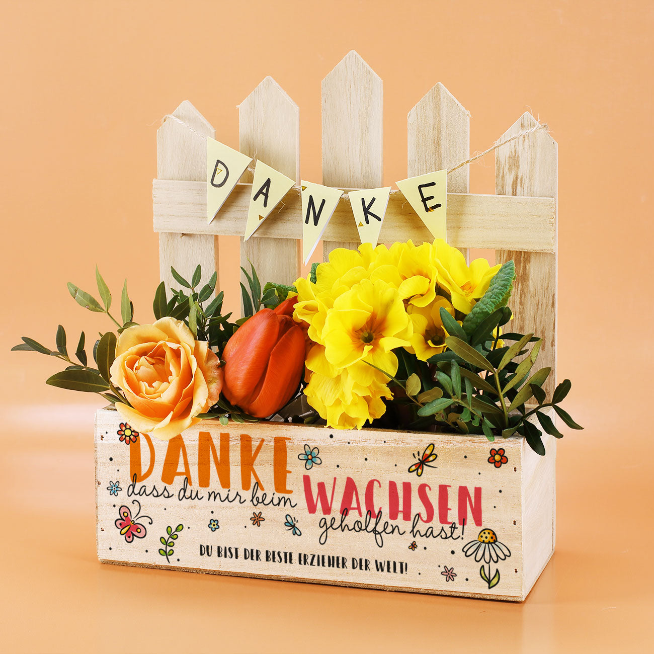 DIY-Pflanzkiste mit farbigem Druck und dem Text „Du bist der beste Erzieher der Welt!“ – ideal als Abschiedsgeschenk