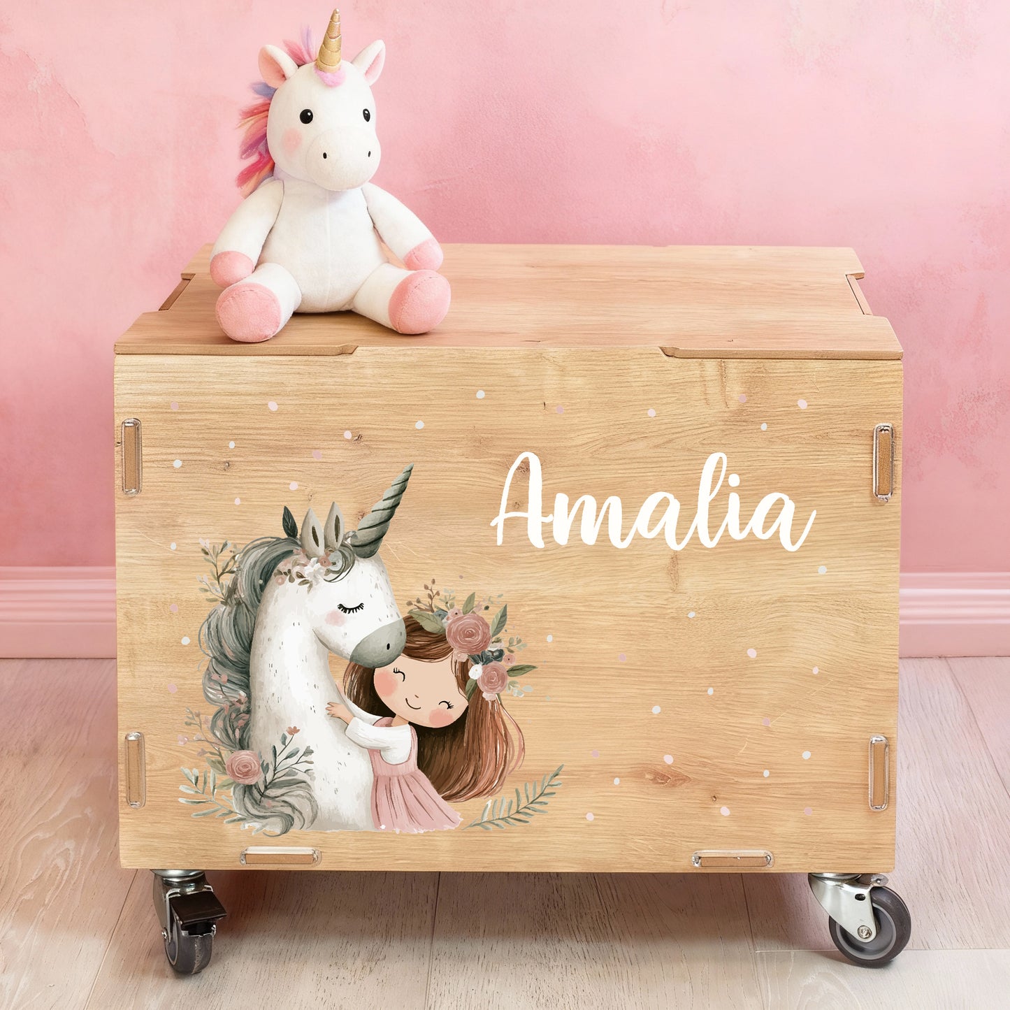 Personalisierte clipfritz® Rollkiste aus Holz mit Einhorn-Prinzessin-Motiv und Namen „Amalia“, Spielzeugkiste auf Rollen im Kinderzimmer