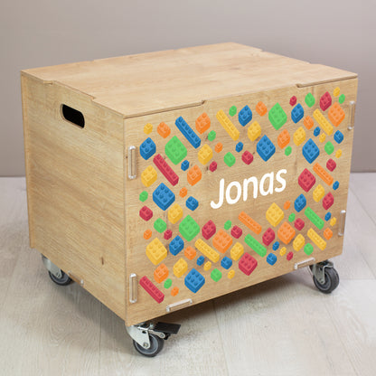 Personalisierte Rollbox aus Holz von clipfritz - Bunte Bausteinwelt | Kinder-Spielzeugkiste mit Name