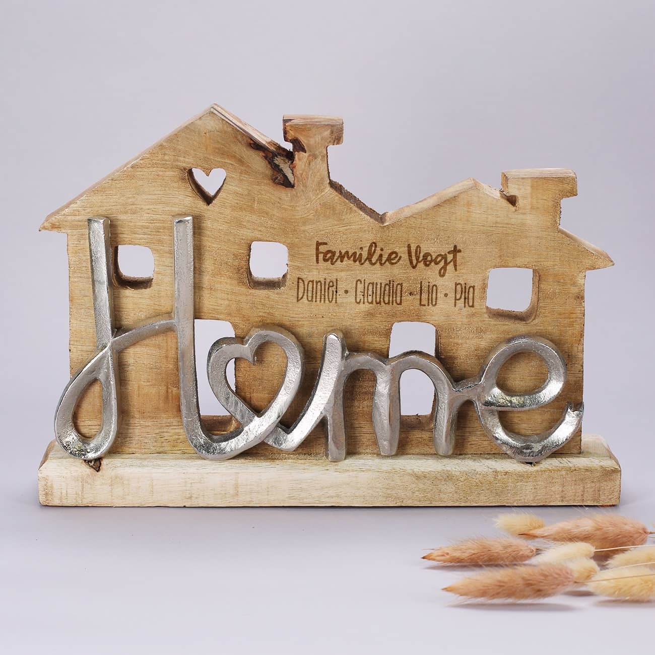 Graviertes Holzhaus