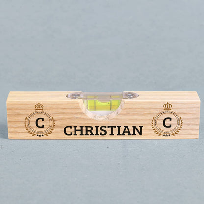 Kleine Wasserwaage aus Holz mit Aufdruck