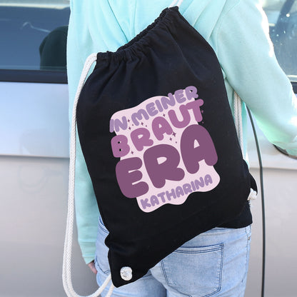 JGA Baumwoll-Rucksack mit Wunschname für die Braut-to-be | Schwarz & Natur