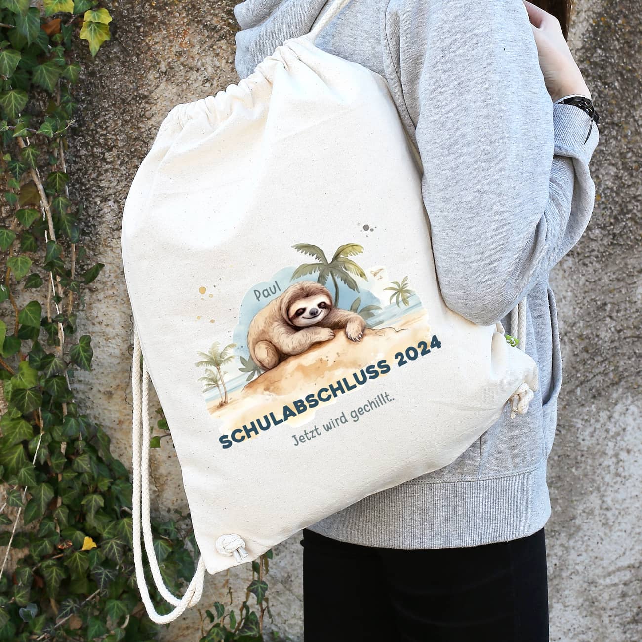 Zum Schulabschluss - Baumwoll-Rucksack mit Faultier, Name und Wunschtext bedruckt