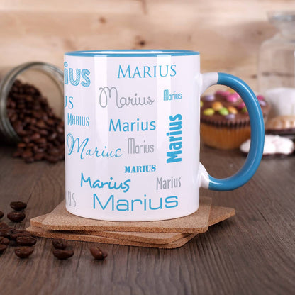 Tasse mit Ihrem Wunschnamen und hellblauem Henkel und Rand