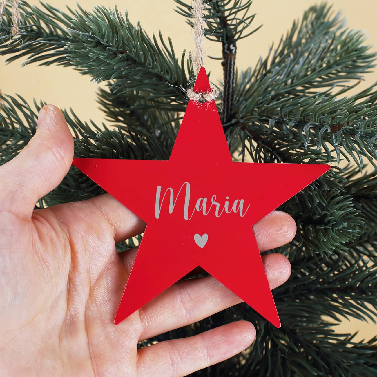 Mit Name und kleinem Herz graviert