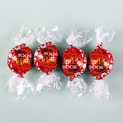 Wie schön, dass es Dich gibt. - 4 Lindorkugeln in kleiner Geschenkverpackung