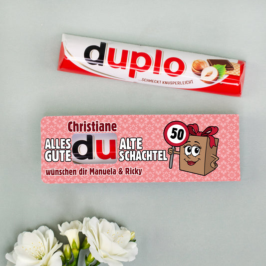 Original duplo Riegel neben personalisierter Alte Schachtel Banderole mit Name Christiane und Alter 50