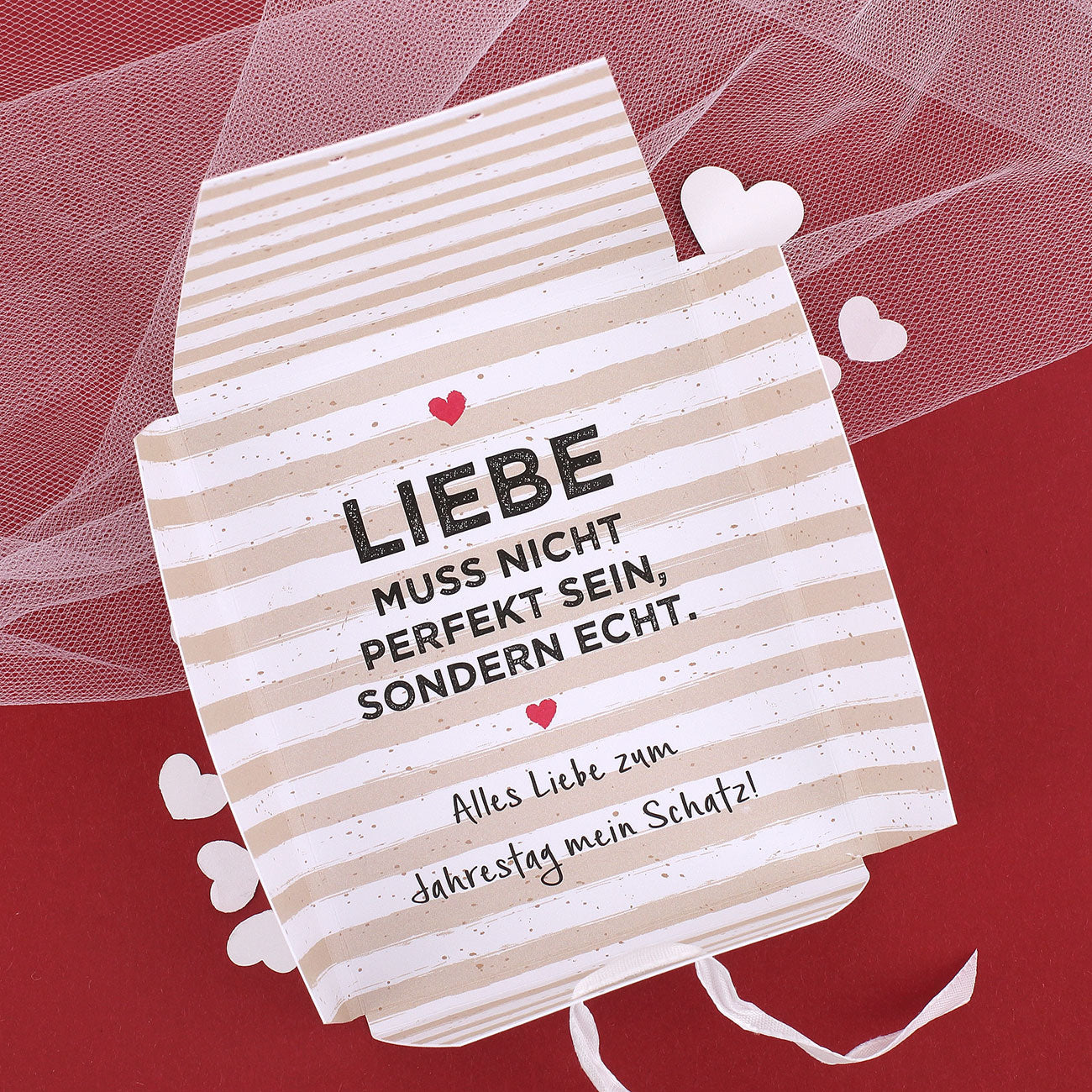 Geöffnete Verpackung für Herzarmband - Liebe muss echt sein