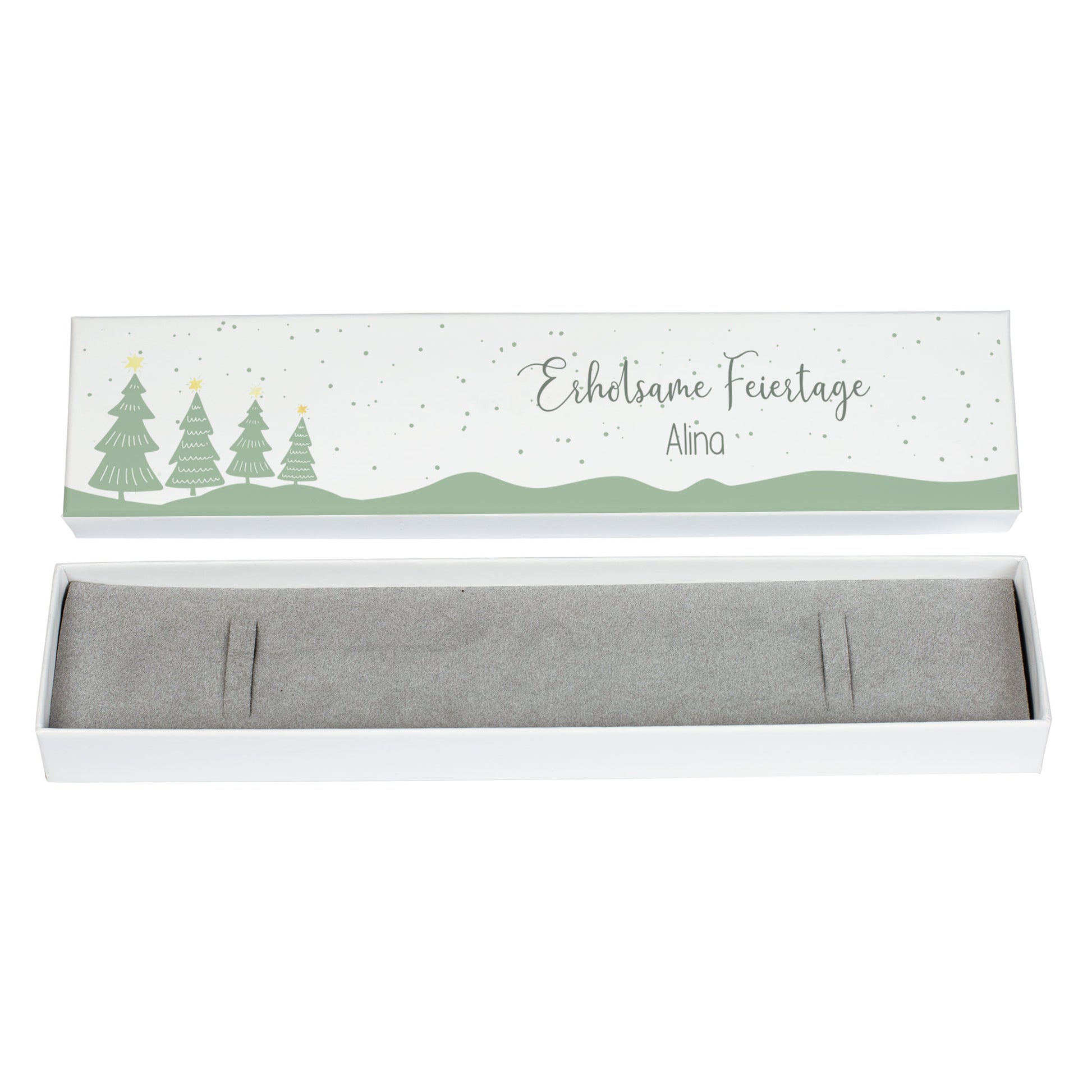 Geöffnete Schmuckverpackung mit winterlichem Motiv und grauem Schaumstoffeinsatz