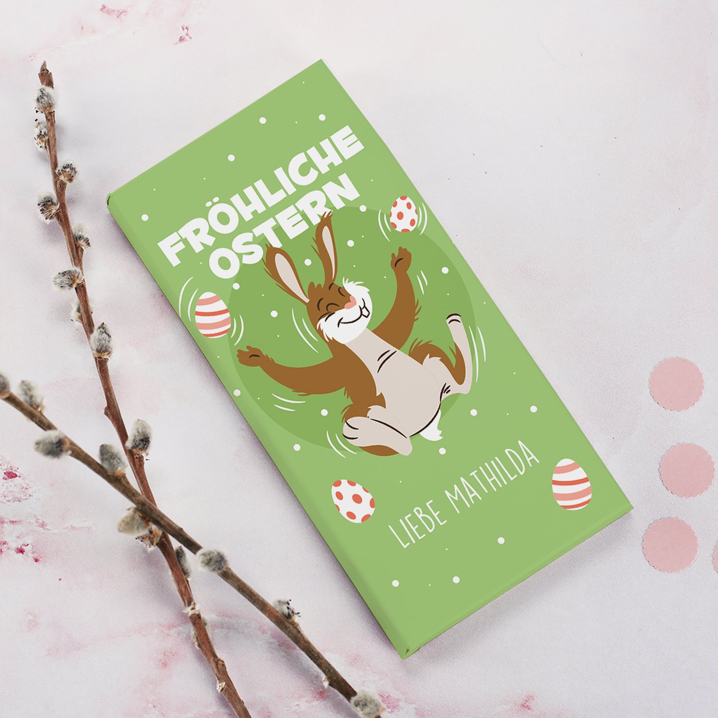 Schokolade zu Ostern mit Wunschtext und fröhlichem Osterhasenmotiv