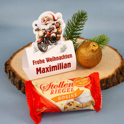 Personalisierte Mini-Stollen-Geschenkverpackung „Frohe Weihnachten Maximilian“ neben 80 g Stollenriegel Rosine