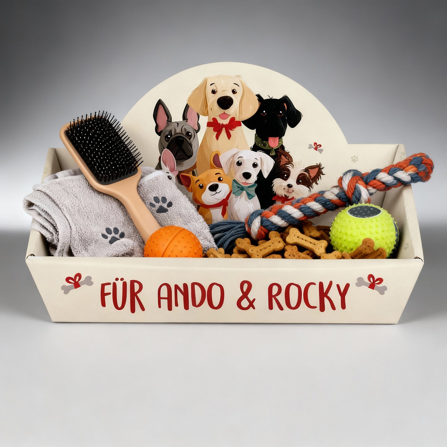 Befüllter Geschenkkorb für Hunde mit Spielzeug und Leckerlis