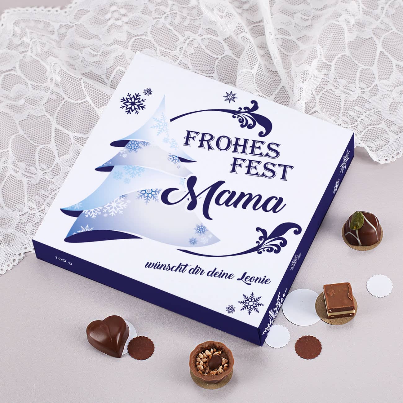 100 g Lindtpralinien "Frohes Fest" mit Name und Wunschtext