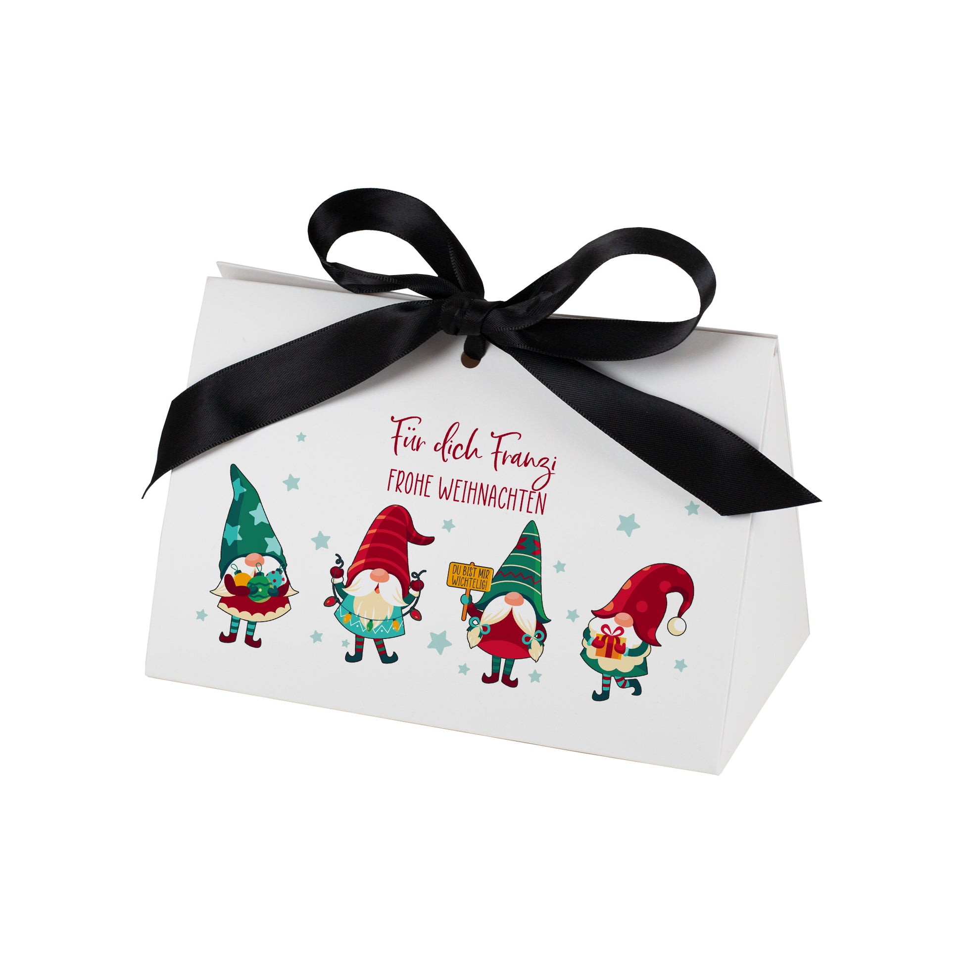 Freigestellte Abbildung der weihnachtlichen Geschenkverpackung in mittlerer Größe auf weißem Hintergrund. Die Tasche ist mit schwarzer Satinschleife verschlossen und zeigt vier farbige Wichtel sowie den personalisierten Text „Für dich Franzi – Frohe Weihnachten“. Das Motiv steht klar im Vordergrund und alle Details sind deutlich sichtbar.