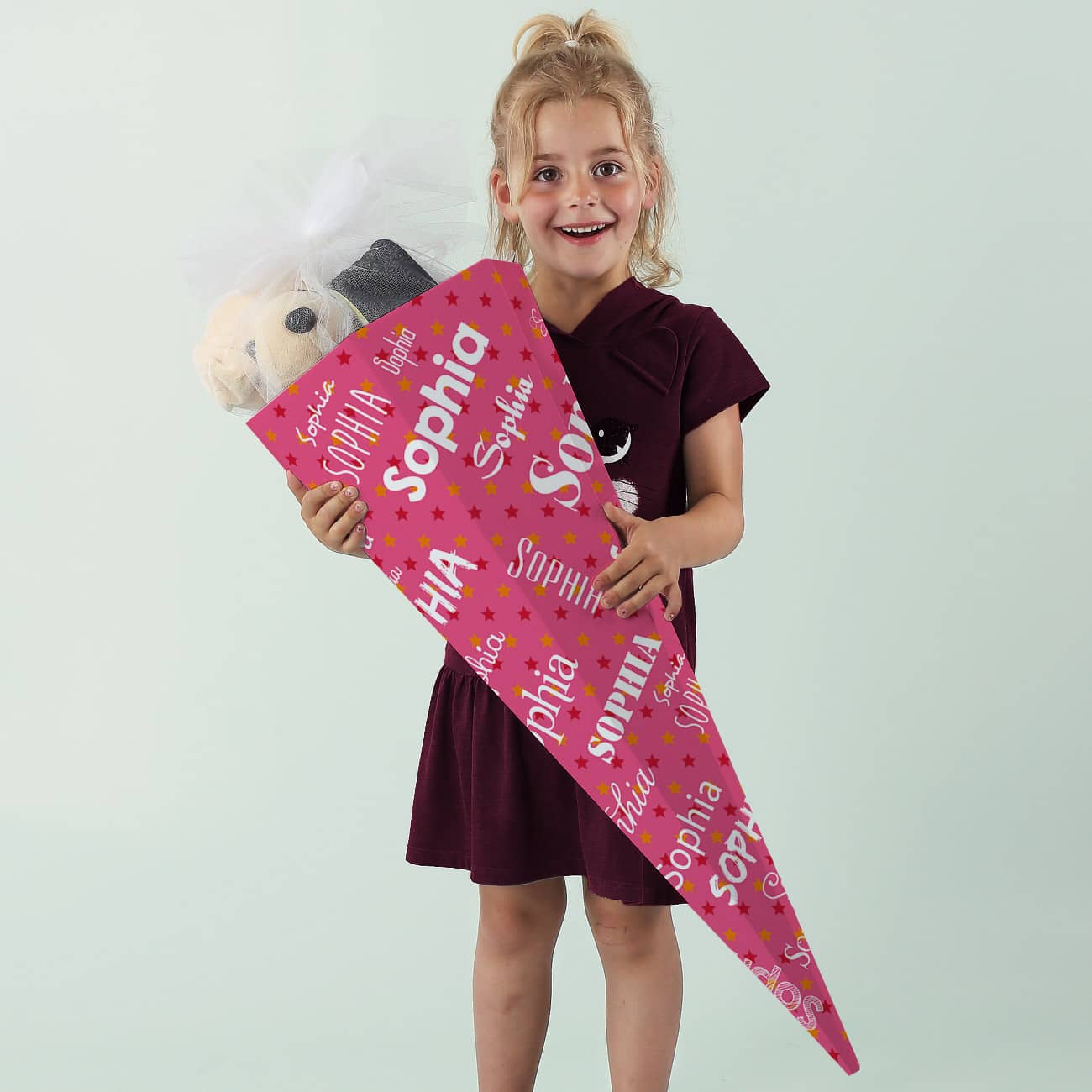 Rosa Zuckertüte mit Name in verschiedenen Schriftarten