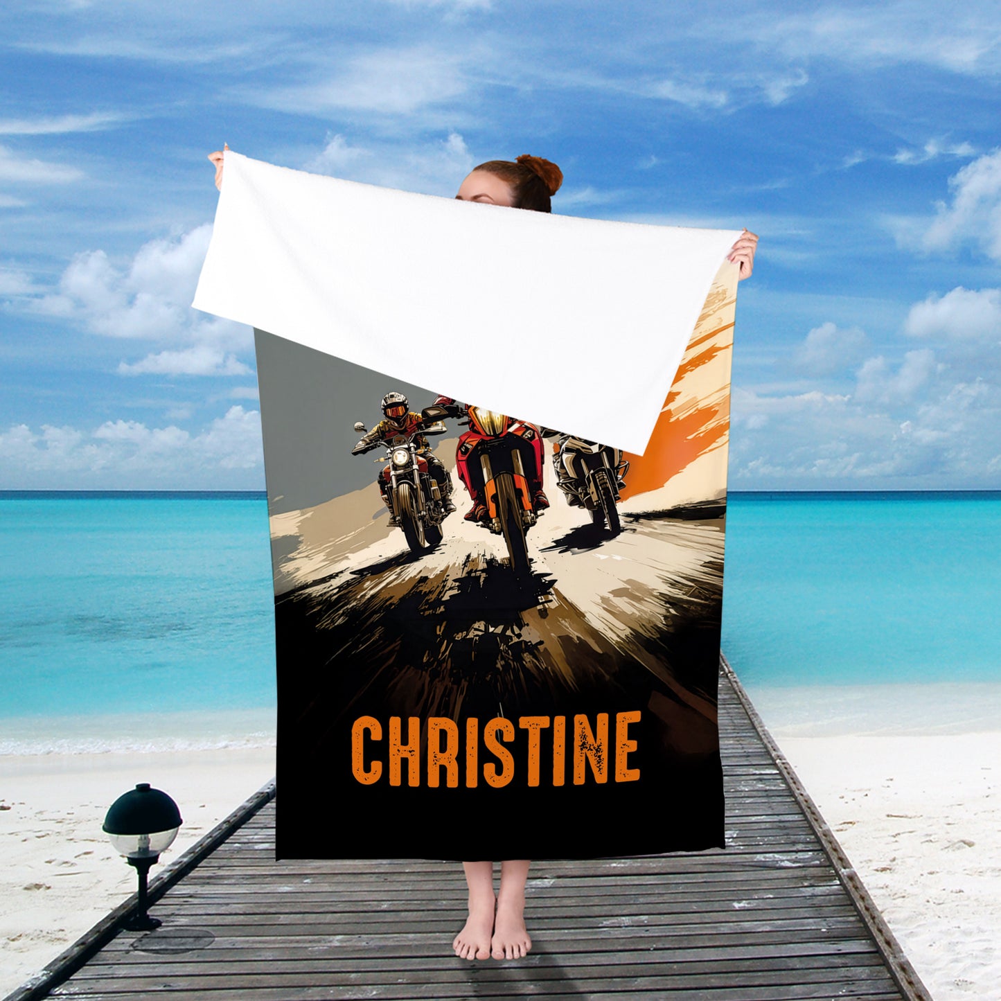 Großes Strandtuch für Motorradfahrer mit Wunschtext und Name Christine, am Meer gehalten