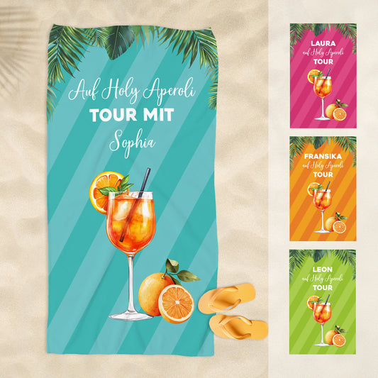 Alle Farbvarianten des personalisierten Handtuchs mit Aperol-Motiv nebeneinander dargestellt – jeweils mit individuellem Wunschtext.