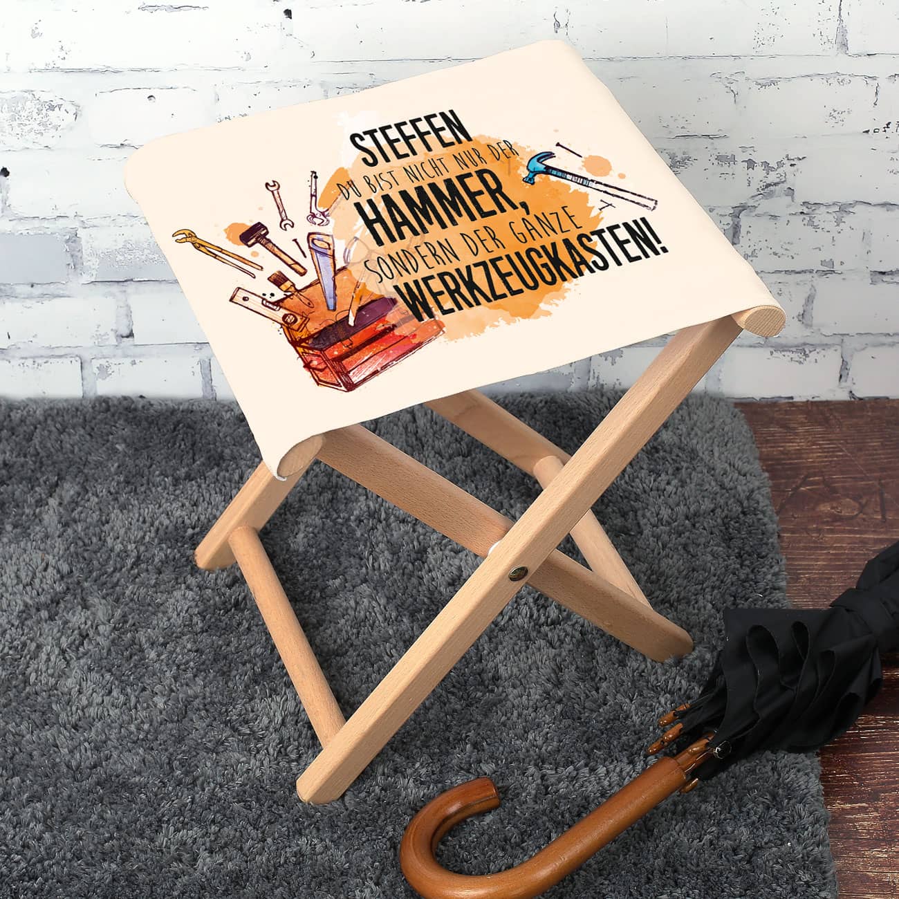 Klapphocker mit Kompliment