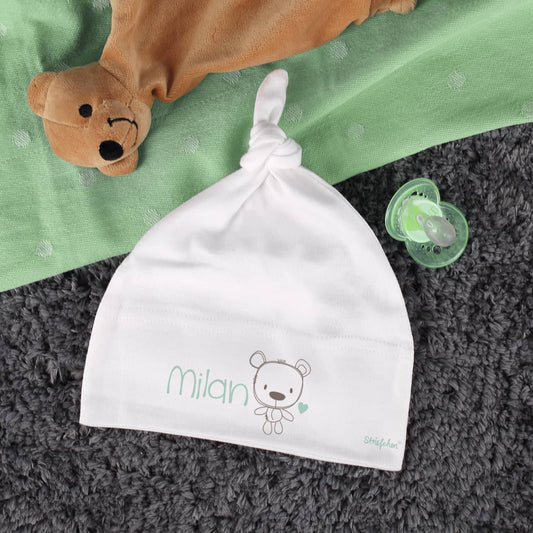 Weiße Babymütze mit Zipfel