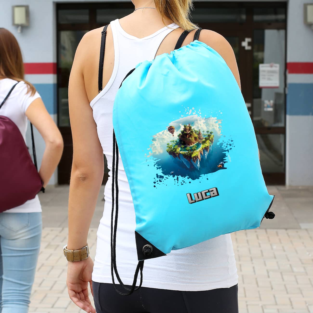 Pixel-Art Sportbeutel in hellblau mit Insel und Name