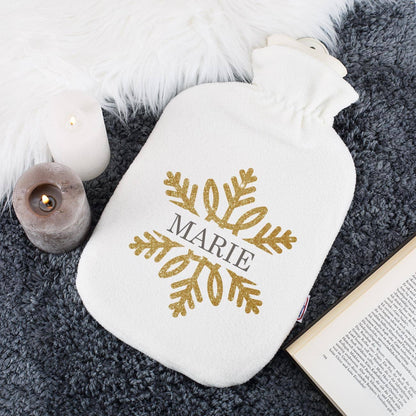Kuschelige Wärmflasche mit Schneeflocke in Goldoptik und Name bedruckt
