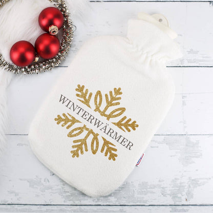 Kuschelige Wärmflasche mit Schneeflocke in Goldoptik und Wunschtext bedruckt